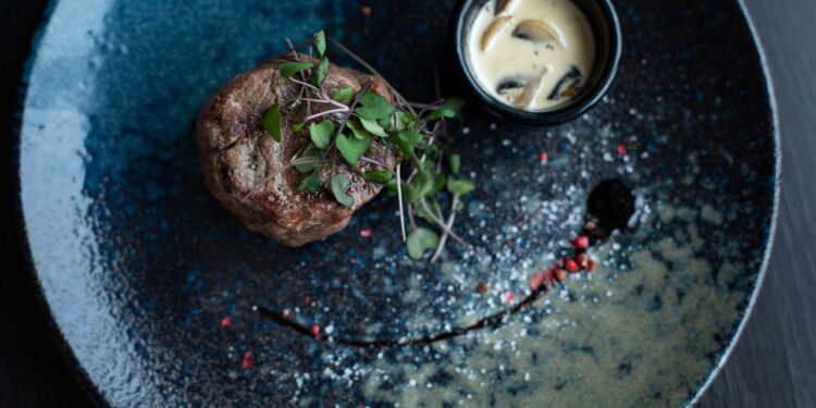 Couple enjoying an affordable Michelin-star lunch in Paris.