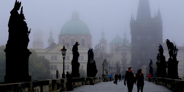 best european cities to visit in january: a quiet, frosty city square at dawn
